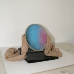 Thirteen years ago a woman once forced me to go and search for my inner beauty. Now I feel like I can still go back, can still go backsmall desk-sized make-up mirror, worn stockings, watercolor on rice paper, glue, black color garbage plastic bag, plastic pc cardboard11,5cm 2012